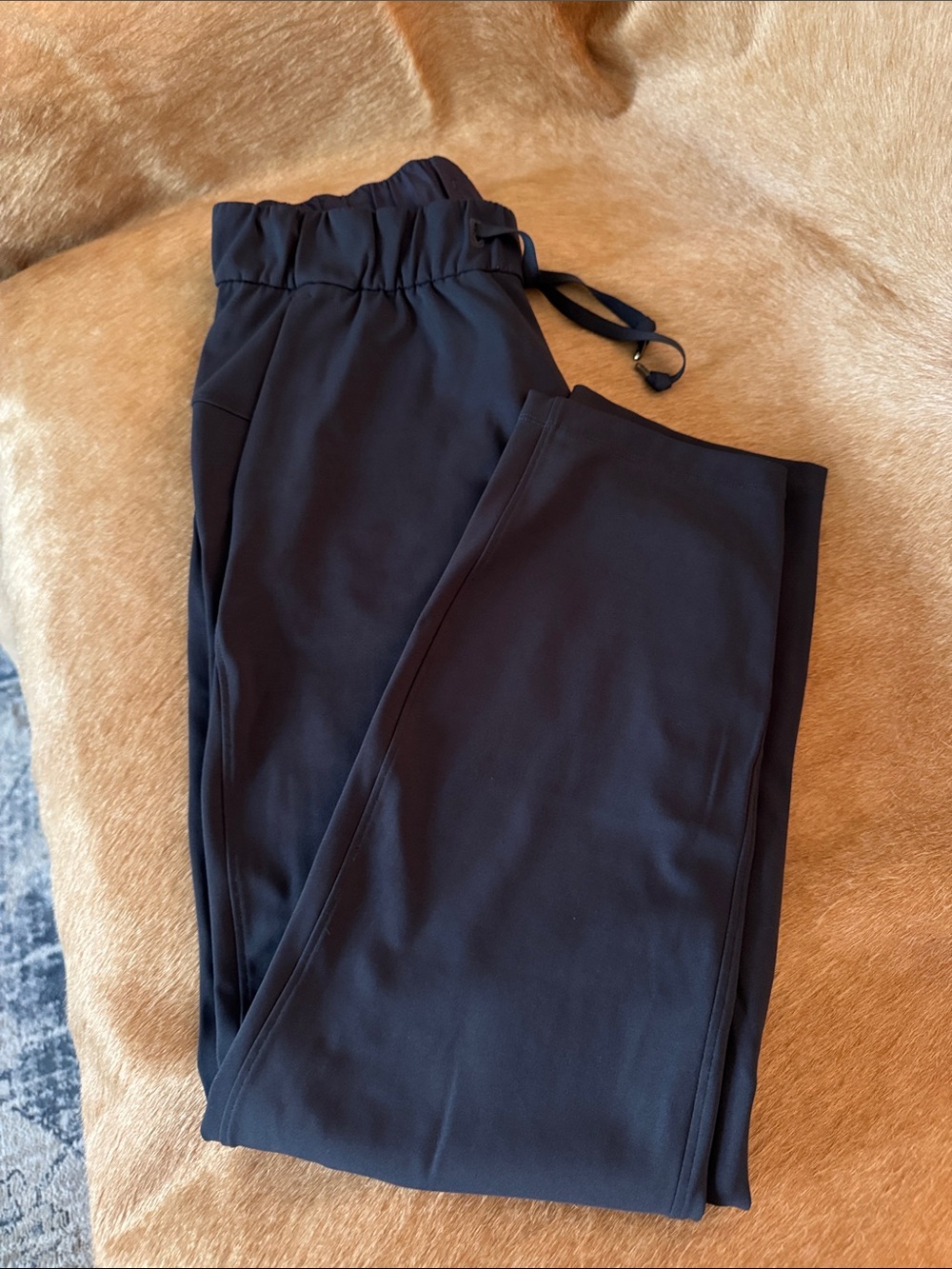 Lululemon Trouser style pants. Elastic waistband. Side pockets.  Straight leg